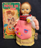 Vintage Wind Up TN Japan Ponytail Girl With Duck