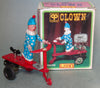 Vintage Tin Wind Up Roli Zoli Clown Riding Scooter